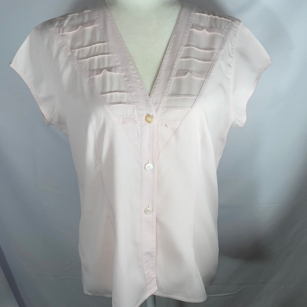 Blouse by Raspini.